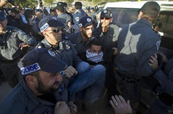 Israeli border police arrested Palestinian protesters at the Bab al-Shams 'outpost' east of Jerusalem last week [AFP]